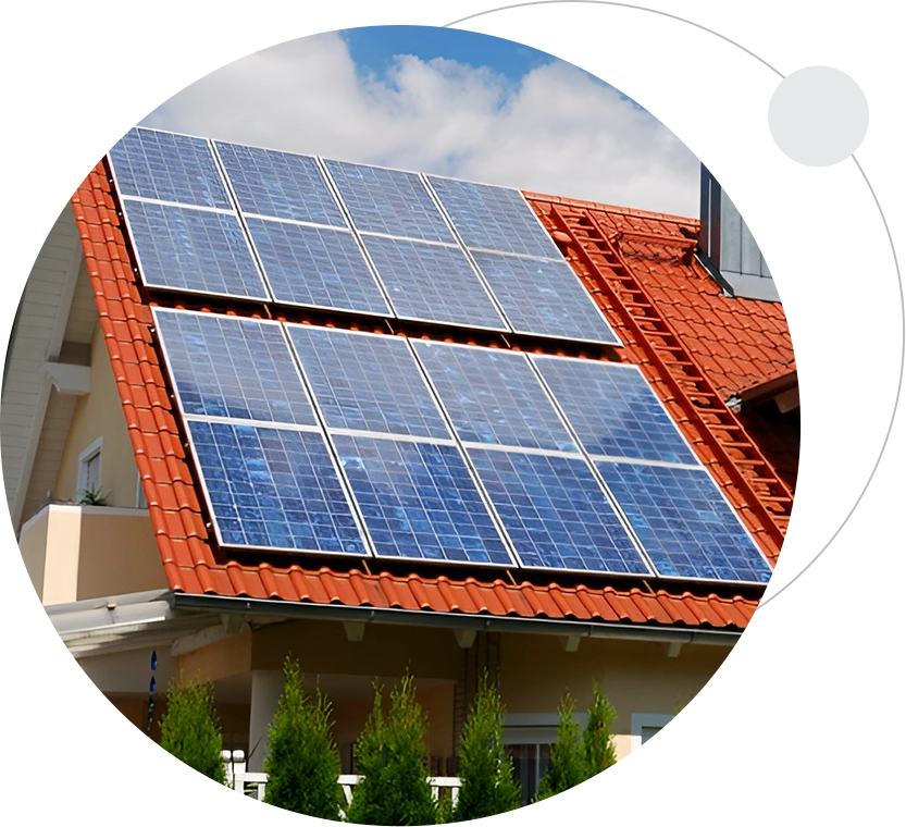 A red roof with several solar panels on it.