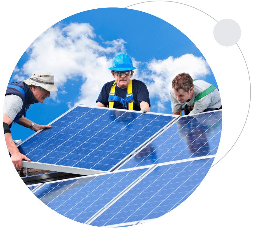 Three men working on a solar panel.